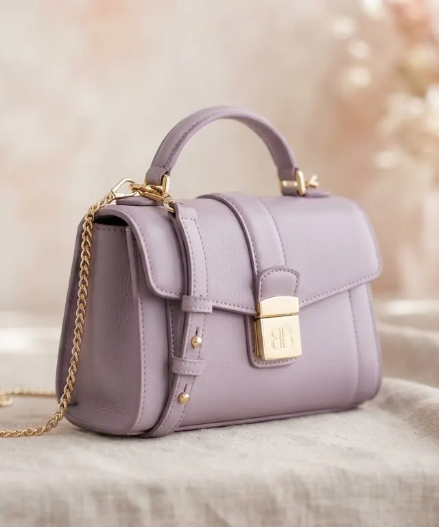 Small lavender satchel bag with gold-tone clasp